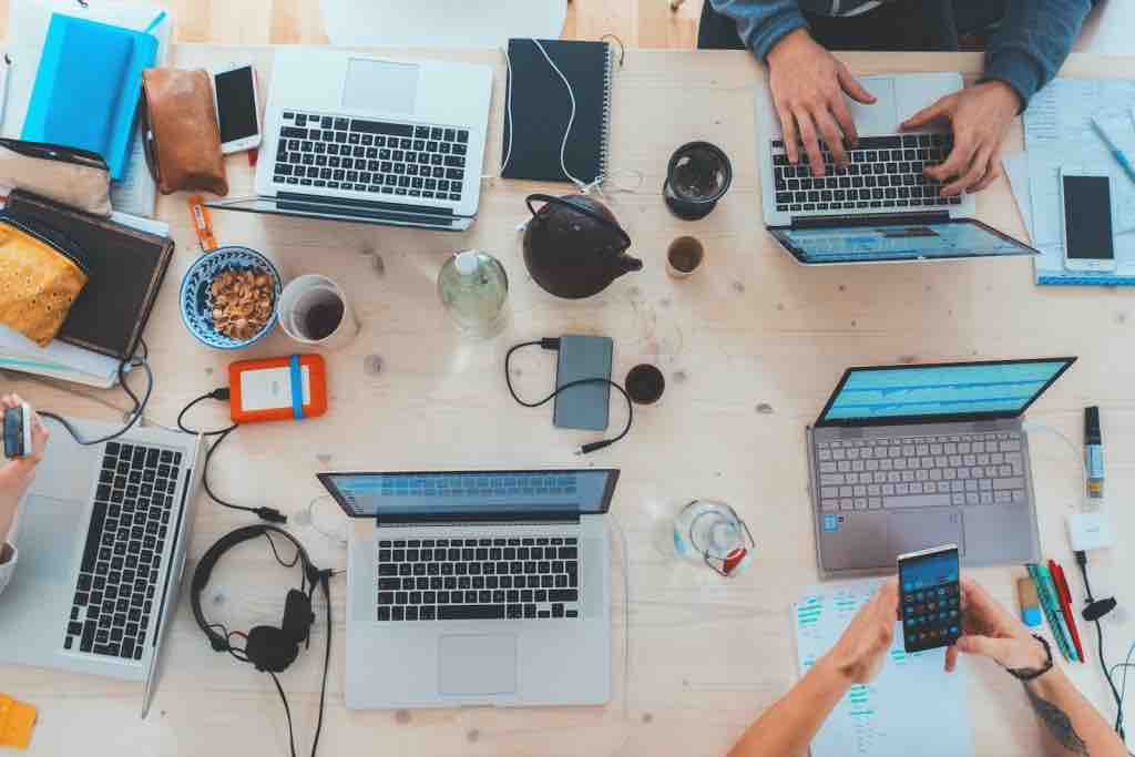 table of people coworking