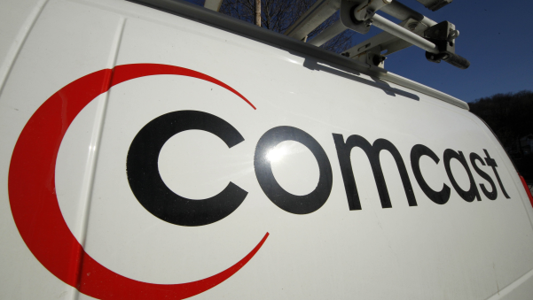 Comcast logo on a white van